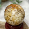 Golden Healer with Agate and Cave | Sphere