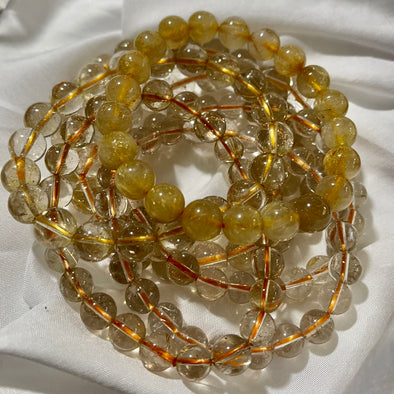 Golden Rutilated Quartz Round Bead Bracelets